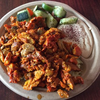 Chicken shawerma plate with cucumbers and yogurt