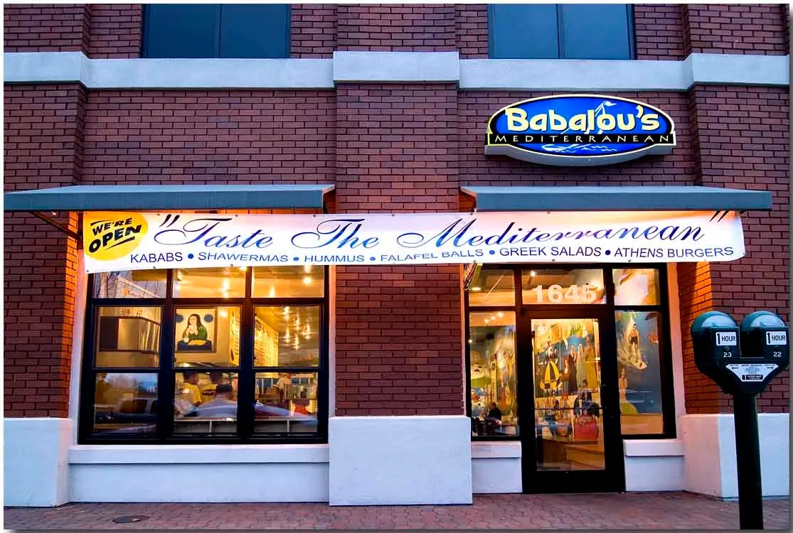 Babalou's storefront on Bonanza Street with blue doors and awnings
