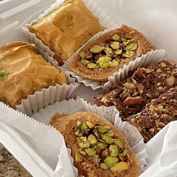 Assorted pistachio baklava in a tray